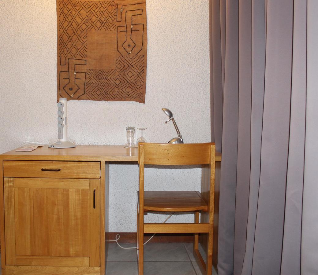 Hotel Le Garni Кигали Экстерьер фото